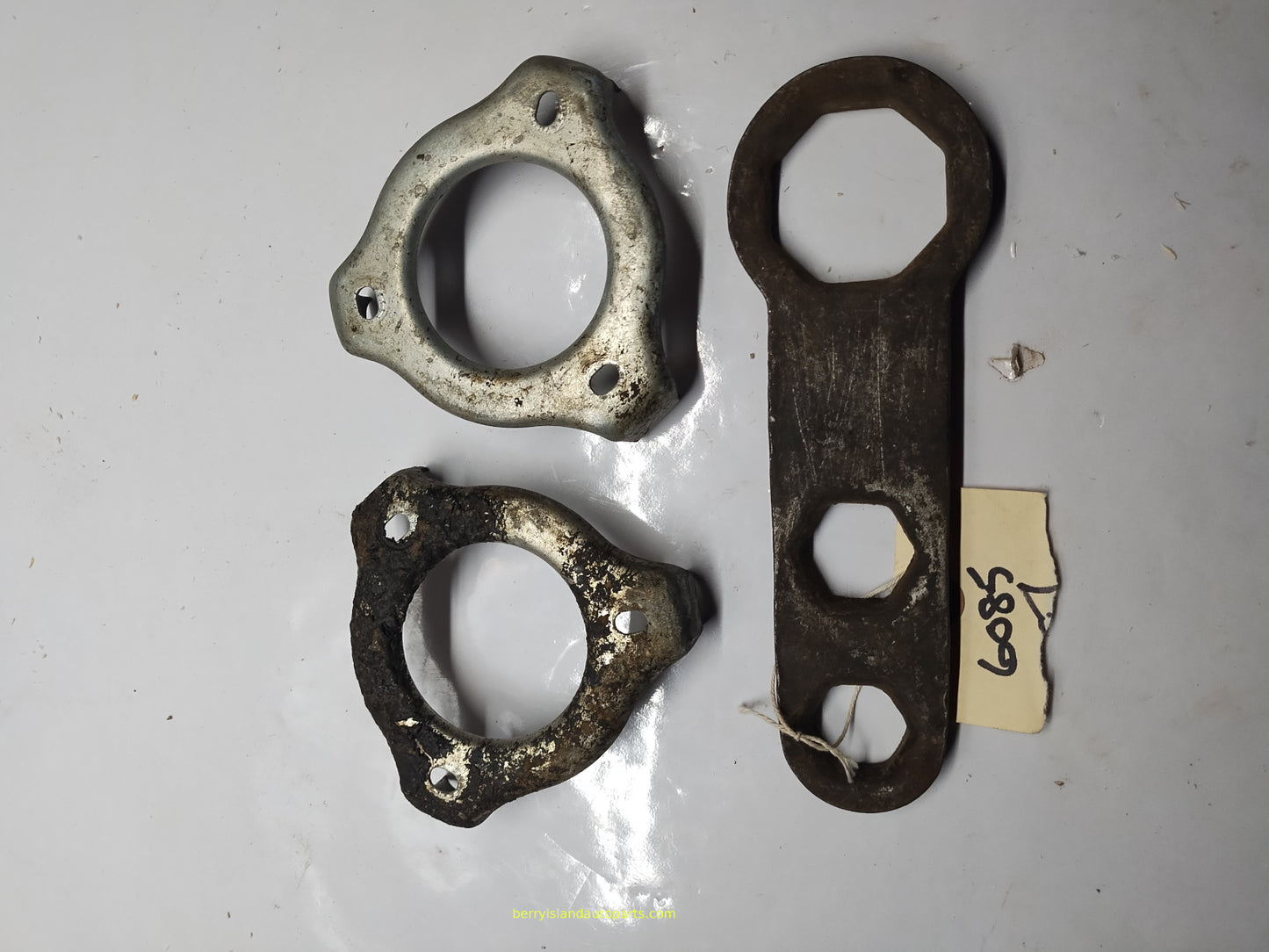 1950s wire wheel cover wrench and 2 center brackets OEM