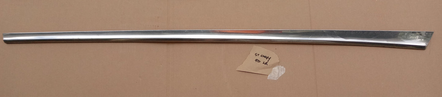 1957 Chevy 4dr upper trim left rear quarter