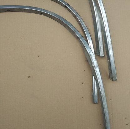 1985 Cadillac wheel lip moulding set